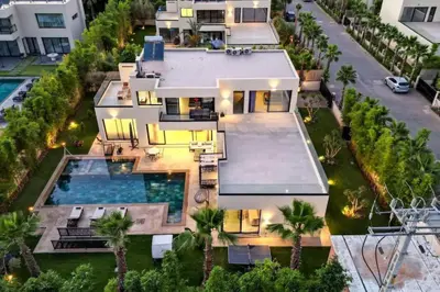 an aerial view of a house with a swimming pool at Villa Athena 4 chambres piscine privée et jaccuzi in Marrakech