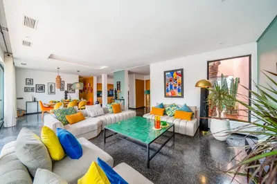 a living room with couches and a table at Villa Nomade - 4 BR BA - Piscine - Parking - Ourika in Sraghna