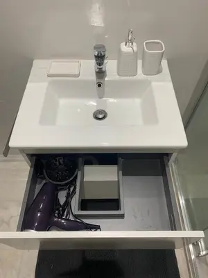 a white sink in a bathroom with a sink at Cozy apartment with pool Bd Mohamed 6 in Marrakech