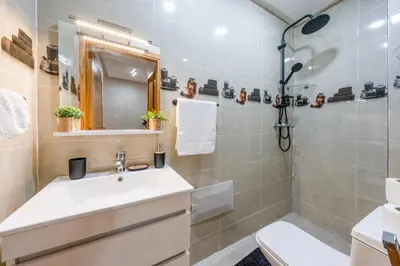 a bathroom with a sink and a shower and a toilet at Comfort and Serenity in the Center of Marrakech in Marrakech