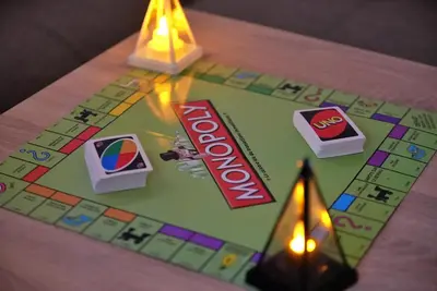 a close up of a monopoly board with a candle at Dar sultane in Marrakech