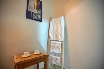 a room with a table and a towel on the wall at Dar sultane in Marrakech