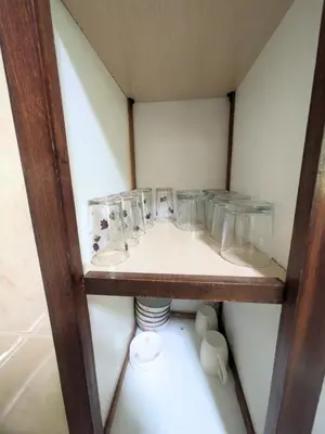 a bathroom with a row of sinks on a shelf at Cozy studio in a good location in Marrakech