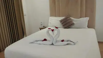 a couple of towel animals on a bed at Villa Rana in Marrakech