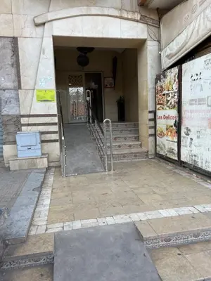 an entrance to a building with stairs and a stair case at family apartment 18 in Marrakech
