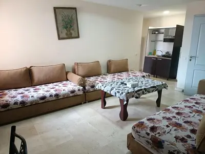 a living room with a couch and a table at family apartment 34 in Marrakech