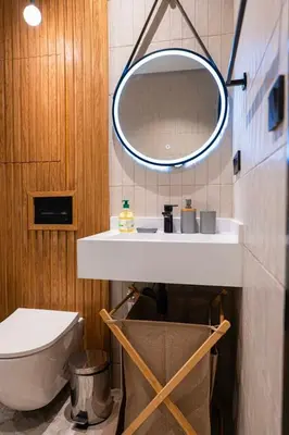 a bathroom with a white sink and a mirror at Prestigia Golf Saphire in Marrakech