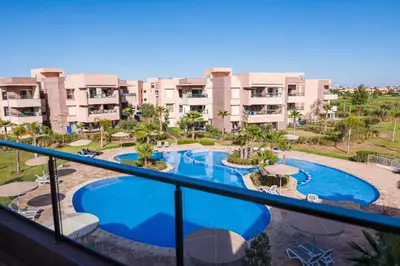 arial view of an apartment complex with a swimming pool at Prestigia Golf Saphire in Marrakech