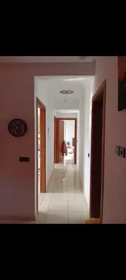 a hallway of a house with a hallway leading to a room at MmAéroport Menara Résidence abrar mhamid 1 in Marrakech