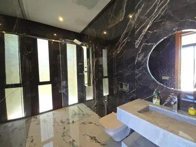 a bathroom with a sink and a mirror at Villa echwitter in Marrakech