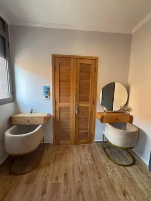 a bathroom with two sinks and a mirror at Beautiful new modern house with full comfort in Marrakech