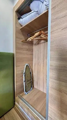 a room with a closet with a tennis racket in it at Luxueux DUPLEX au cœur Marrakech in Marrakech
