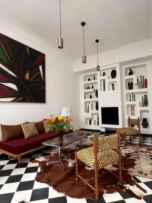 a living room with a couch and a table at Dar Nook in Marrakech