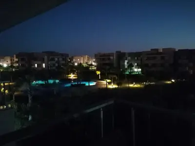 a view of a city at night with buildings at Prestigious residence marrakech with optical fiber in Marrakech