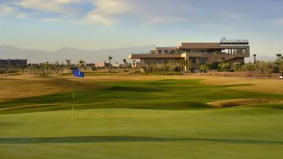 a view of a golf course with a green at Prestigious residence marrakech with optical fiber in Marrakech
