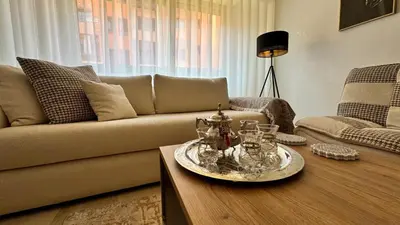 a living room with a couch and a coffee table at Mms in Marrakech