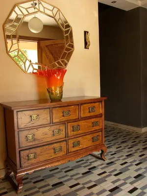 a dresser with a mirror on top of it at Timeless Villa at Golf course with private pool in Marrakech
