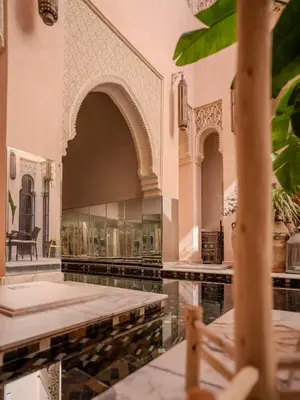 a room with a pool of water in a building at Riad Mayan & Spa in Marrakech