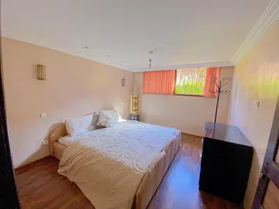 a bedroom with a bed and a window at Amlkis golf royal in Marrakech