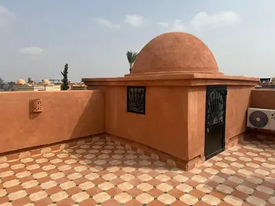 a building with a dome on top of it at Havre de paix à Atlas Golf Resort Marrakech in Marrakech