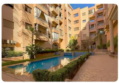 a swimming pool in the middle of a building at Spacious apartment in Marrakech in Marrakech