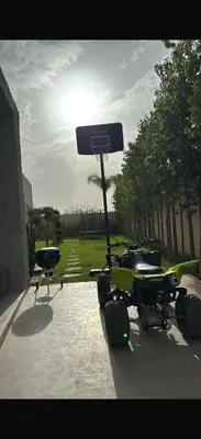 a quad bike parked in a parking lot at Villa coco in Marrakech