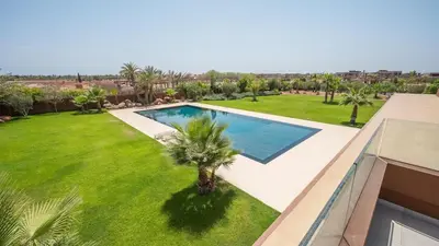 an image of a yard with a swimming pool at Villa Luxe Padel in Marrakech