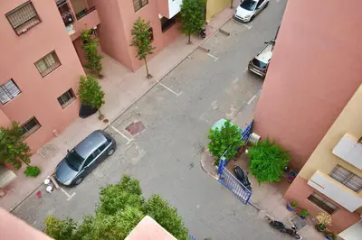 an aerial view of a city street with cars parked at Gold Holidays 02 in Marrakech
