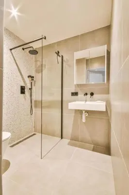 a bathroom with a shower and a sink at Chambre privée dans un appartement bien équipé in Marrakech