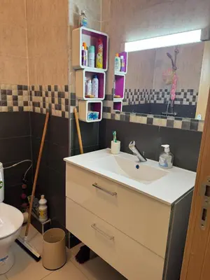 a bathroom with a sink and a toilet at A bright and airy living room in Marrakech