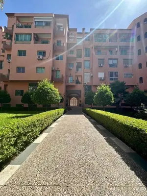 a building with a pathway in front of a building at Modern & Chic Duplex Near The Center, Brand New in Marrakech