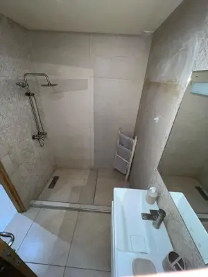 a bathroom with a shower and a sink at Nice apartment in Marrakech