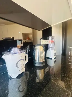 two blenders sitting on a counter in a kitchen at Sublime 2 bedrooms with pool and Wi-Fi Marrakech in Marrakech