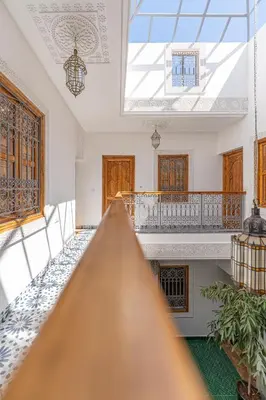 an empty room with a staircase and a ceiling at Riad OM SAADENE in Marrakech