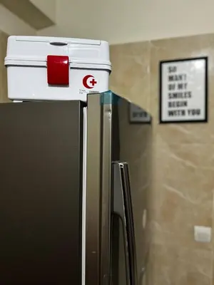 a refrigerator with a container on top of it at Modern Apartment Near Airport in Marrakech