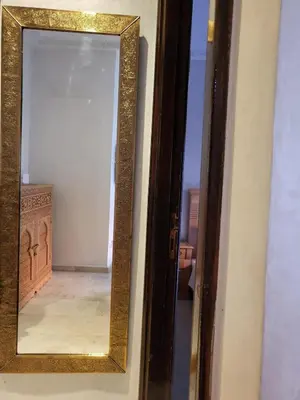 a mirror on the door of a room at Palace-Apartment-Marrakech in Marrakech