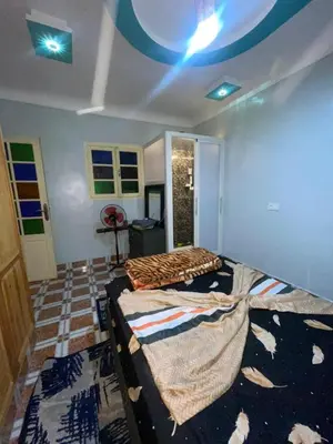 a bedroom with a bed in a room at Une chambre in Marrakech