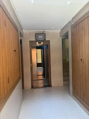 an empty hallway with a door in a building at BELDI and contemporary elegance in Marrakech