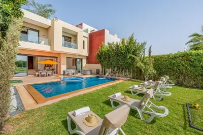 an image of a villa with a swimming pool at Villa cancun resort Luxury Spa-cinéma & jacuzzi in Marrakech