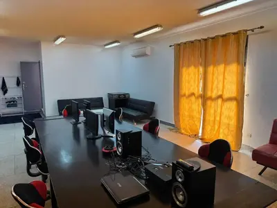 a conference room with a large table and chairs at Chateau Nougat, Marrakech in Marrakech
