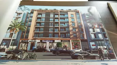 a drawing of a building with cars parked on a street at Cosy résidence Gueliz avec piscine rooftop in Marrakech