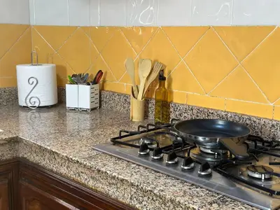 a frying pan sitting on top of a stove in a kitchen at Charmant & chic à Gueliz in Marrakech