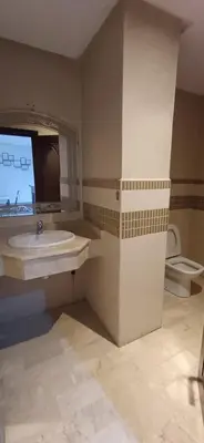 a bathroom with a sink and a toilet at Picasso - Appartement 1 chambre in Marrakech