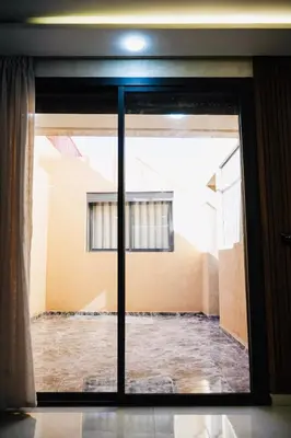 a view from a window of a building at Vaste duplex neuf modernes et raffiné in Marrakech