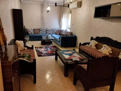 a living room with two couches and a couch at Modern 2 Bedroom Appartement in Gueliz in Marrakech