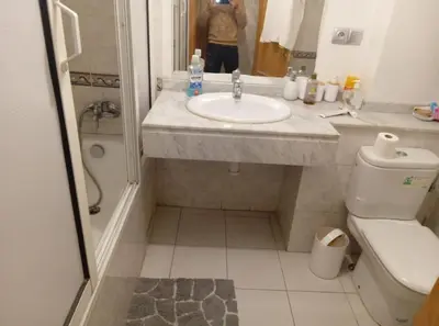 a bathroom with a sink and a toilet at Modern 2 Bedroom Appartement in Gueliz in Marrakech
