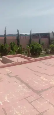 an empty parking lot with a skate park at nice mini villa with pool in Marrakech
