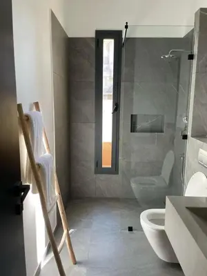 a bathroom with a shower and a toilet and a sink at Villa spacieuse à Marrakech avec piscine privée_222 in Marrakech