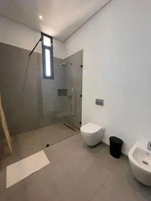 a bathroom with a shower and a toilet and a sink at Villa spacieuse à Marrakech avec piscine privée_222 in Marrakech
