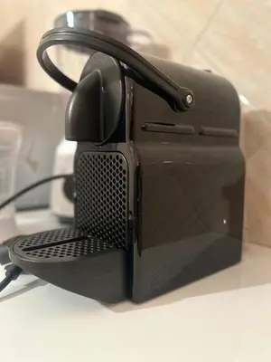 a black toaster sitting on top of a counter at Elegant appartement a Gueliz in Marrakech